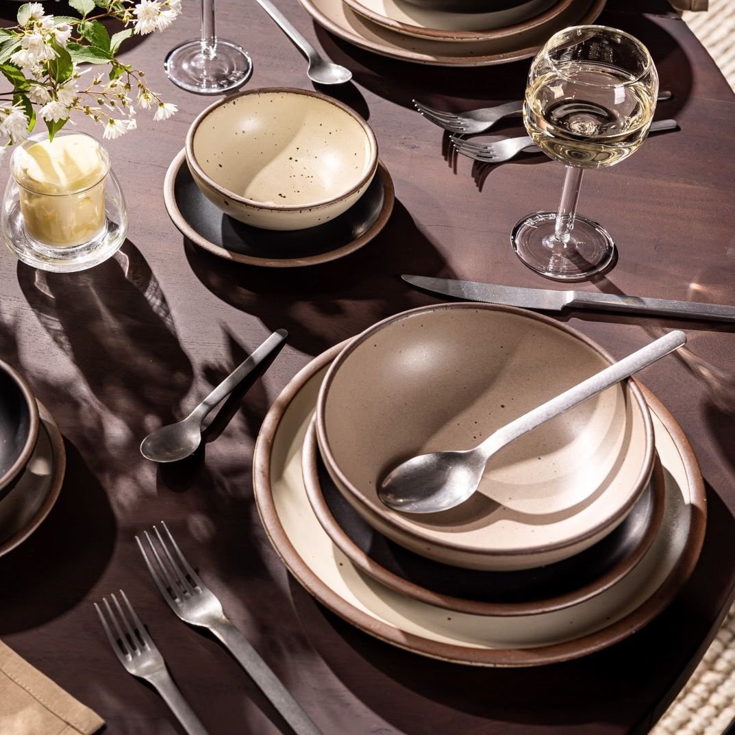 Vella Supply daily bowl in Warm Taupe, in a table setting with other dinnerware