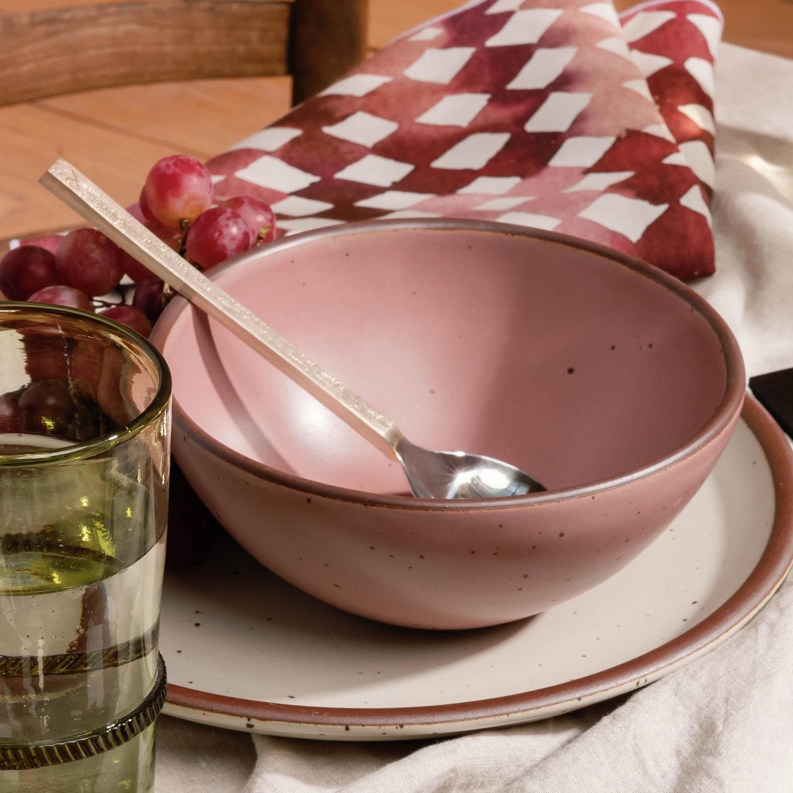 Vella Supply soup bowl in Lilac, in a table setting with other dinnerware