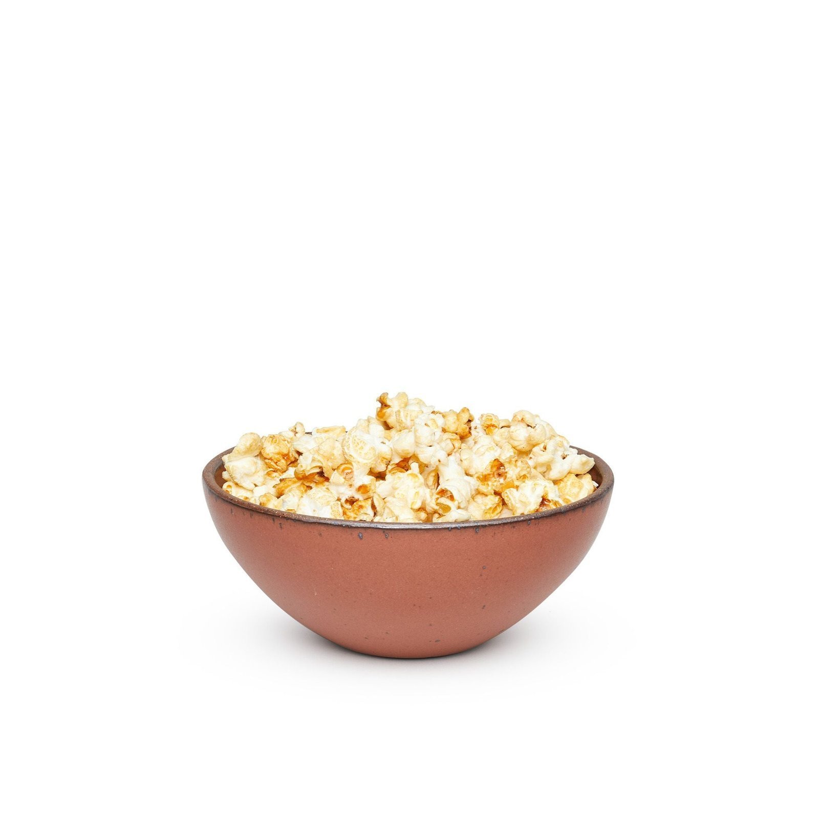 Vella Supply soup bowl in Terracotta, shown with popcorn